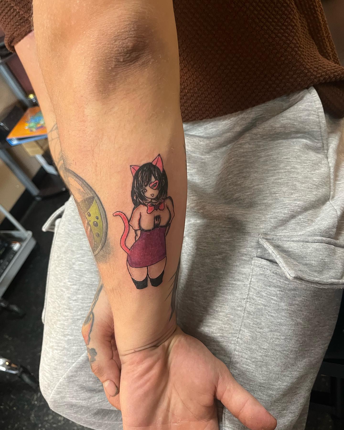 Anime girl anime tattoo on the forearm by Alyssa Turner