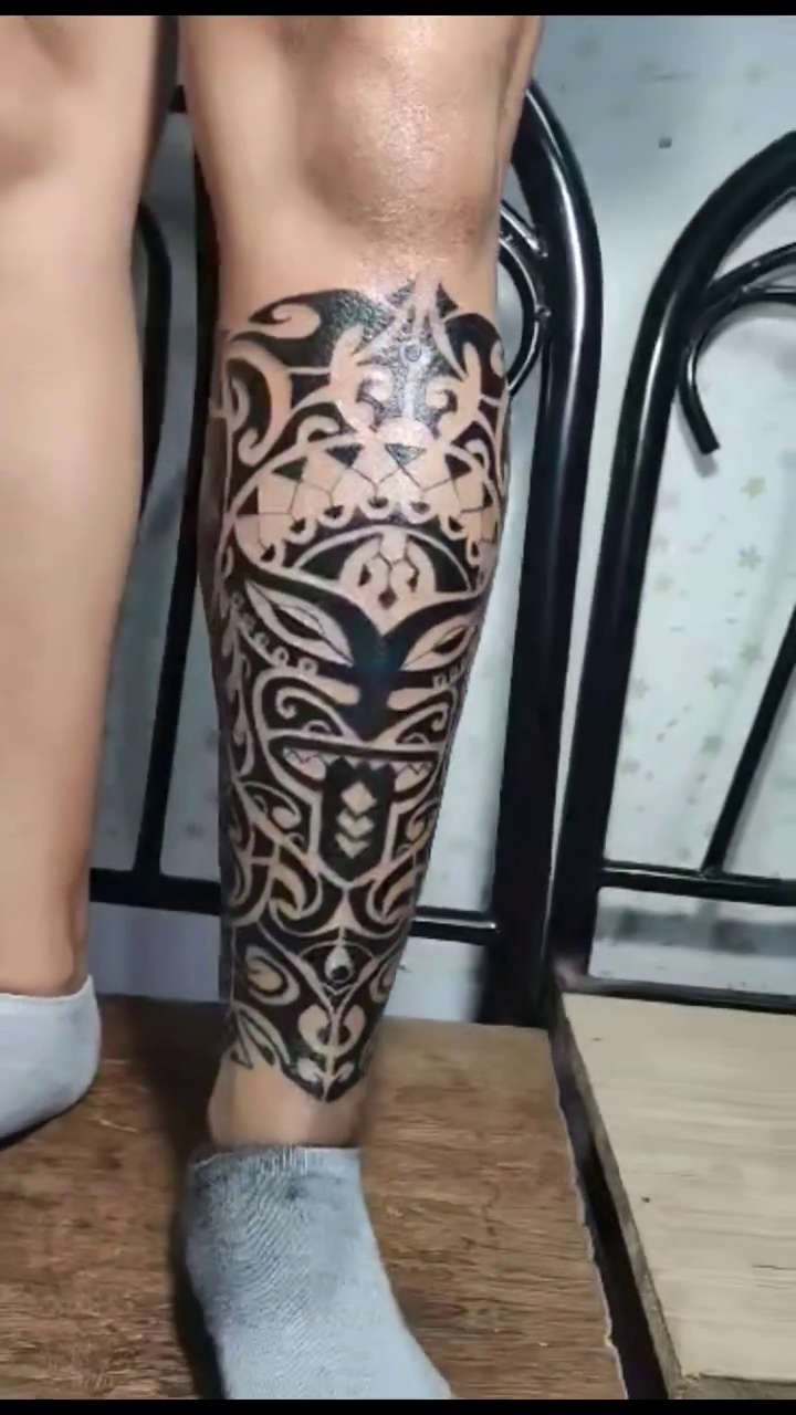 Maori-inspired leg tattoo tribal tattoo on the calf by Ferds Villanueva