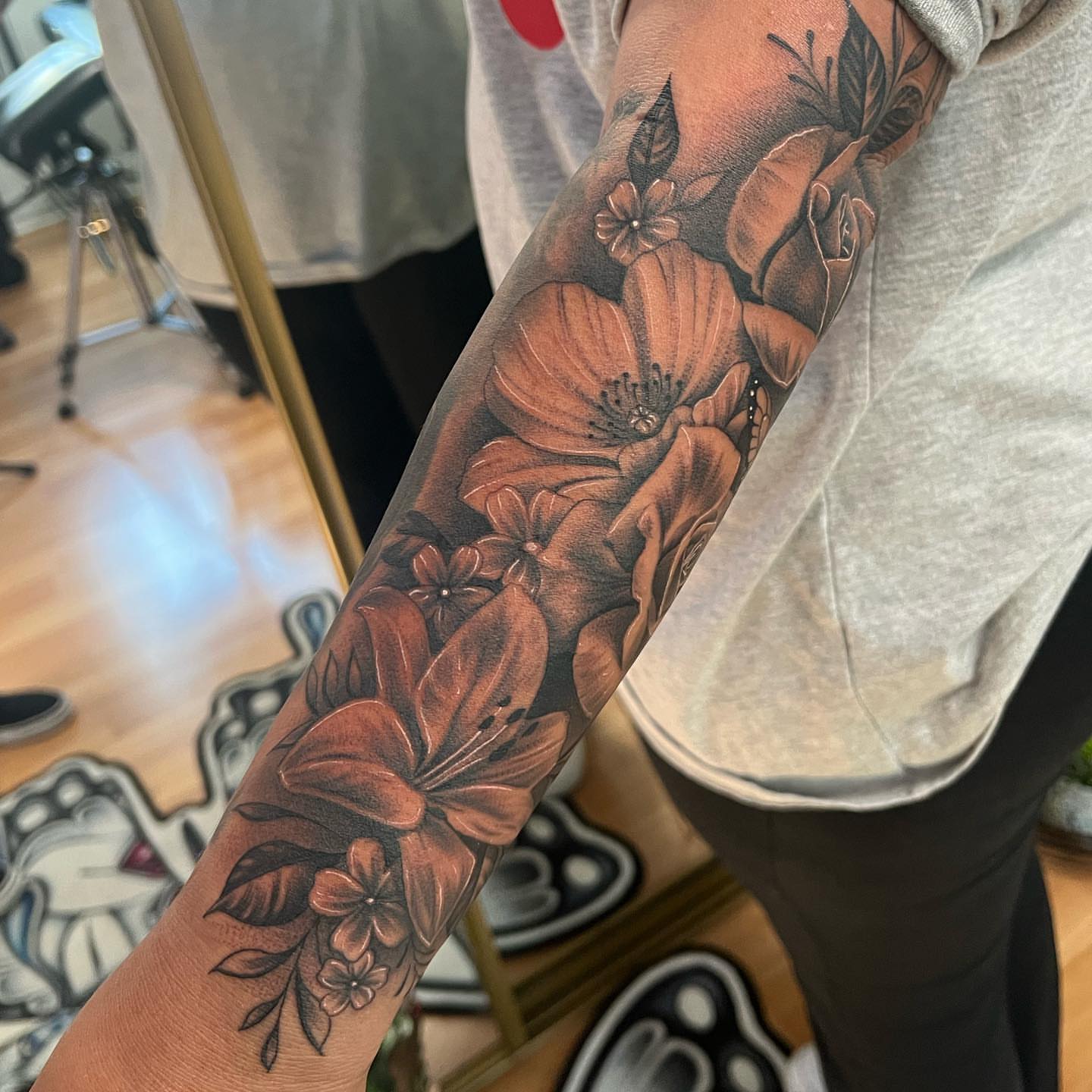 Flowers black and grey tattoo on the forearm by π²πππππππ β‘οΈ