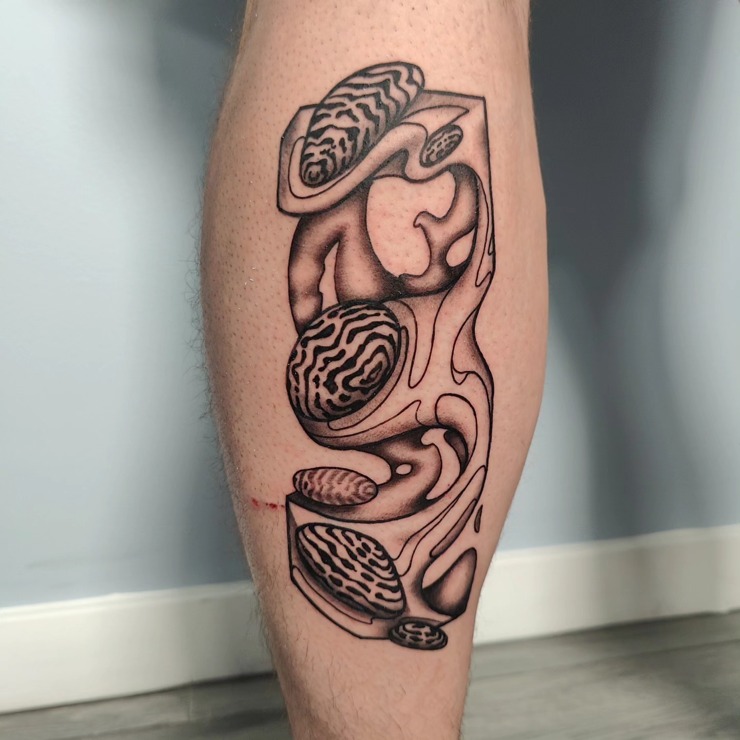 Abstract food black and grey tattoo on the forearm by Ｔｏｍ Ｌｏｒａｎｚ