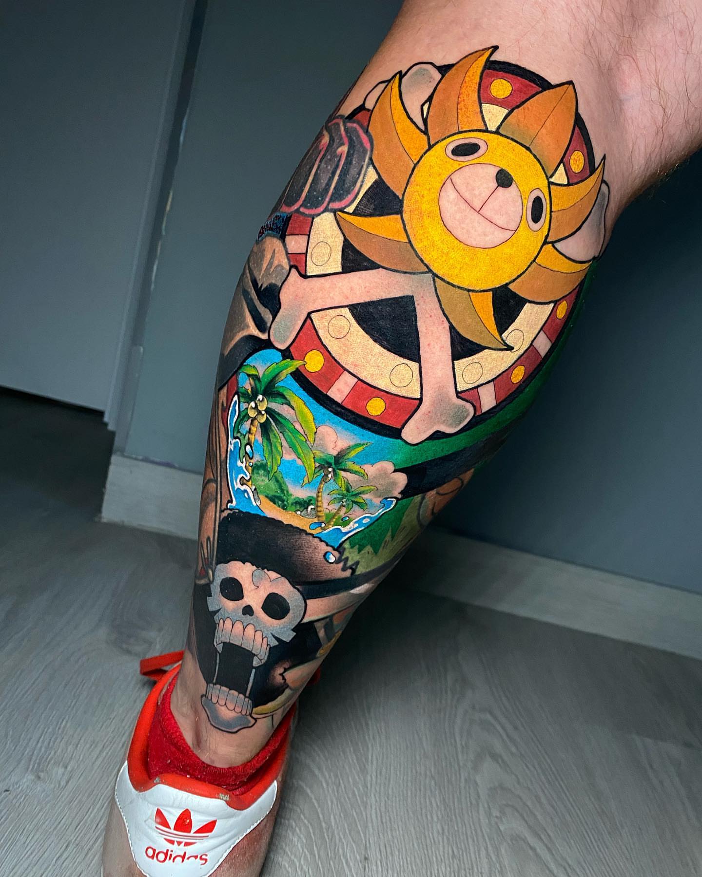 Pirate-themed new school tattoo on the leg by Cristian Romero