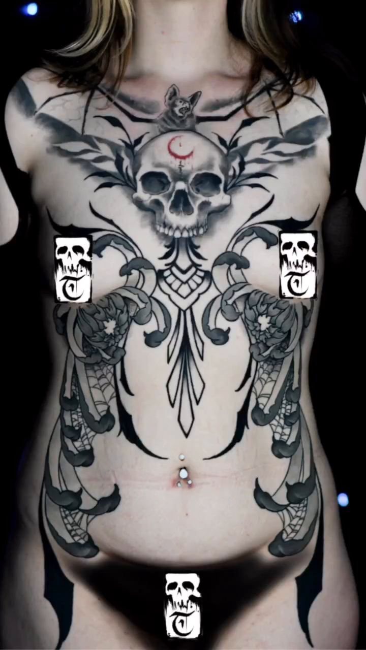 Skull and bat wings dark realism tattoo by Travis Thorpe