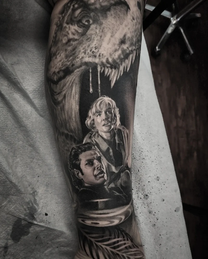 Jurassic Park scene realism tattoo on the forearm by Dani Ryan