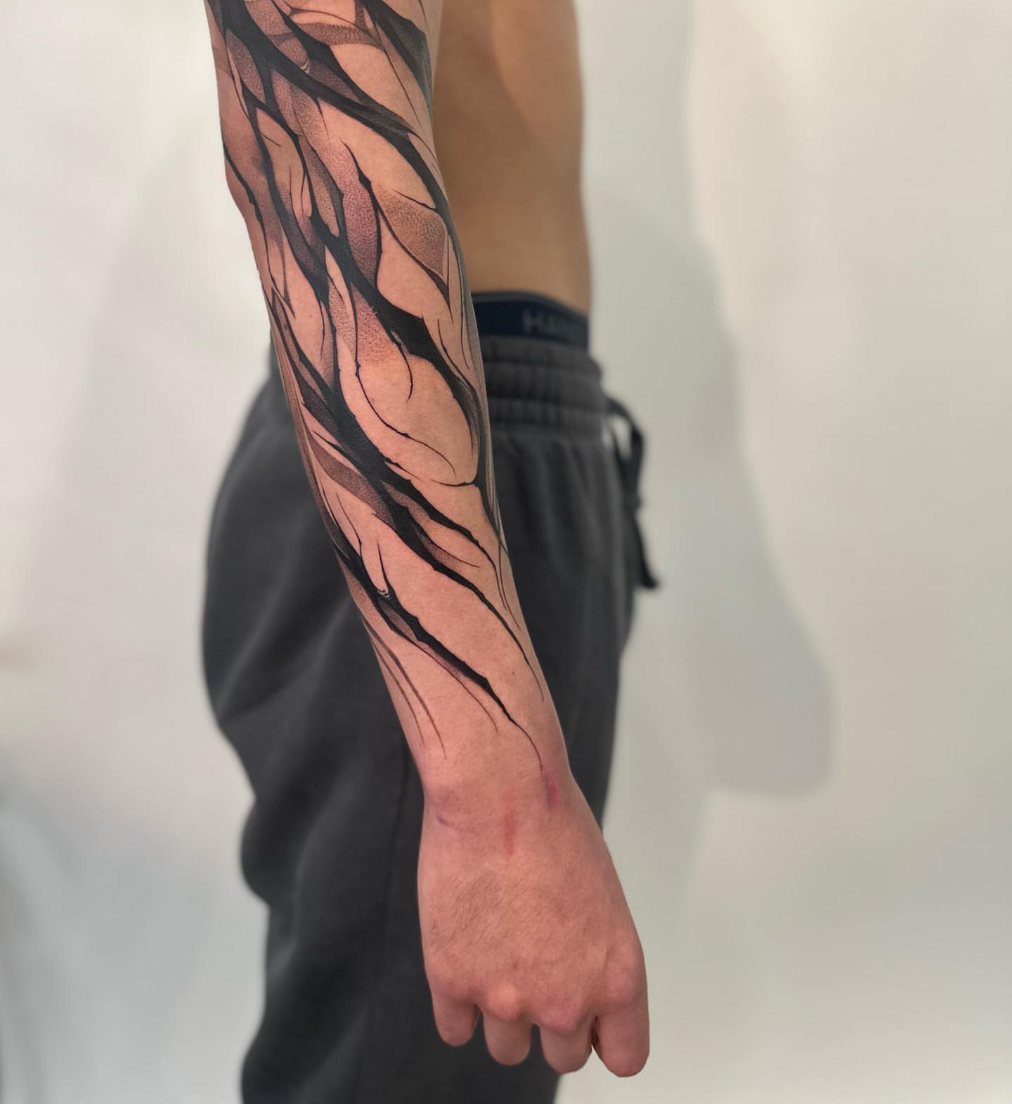 Veins black and grey tattoo on the forearm by Strokin Konstantin
