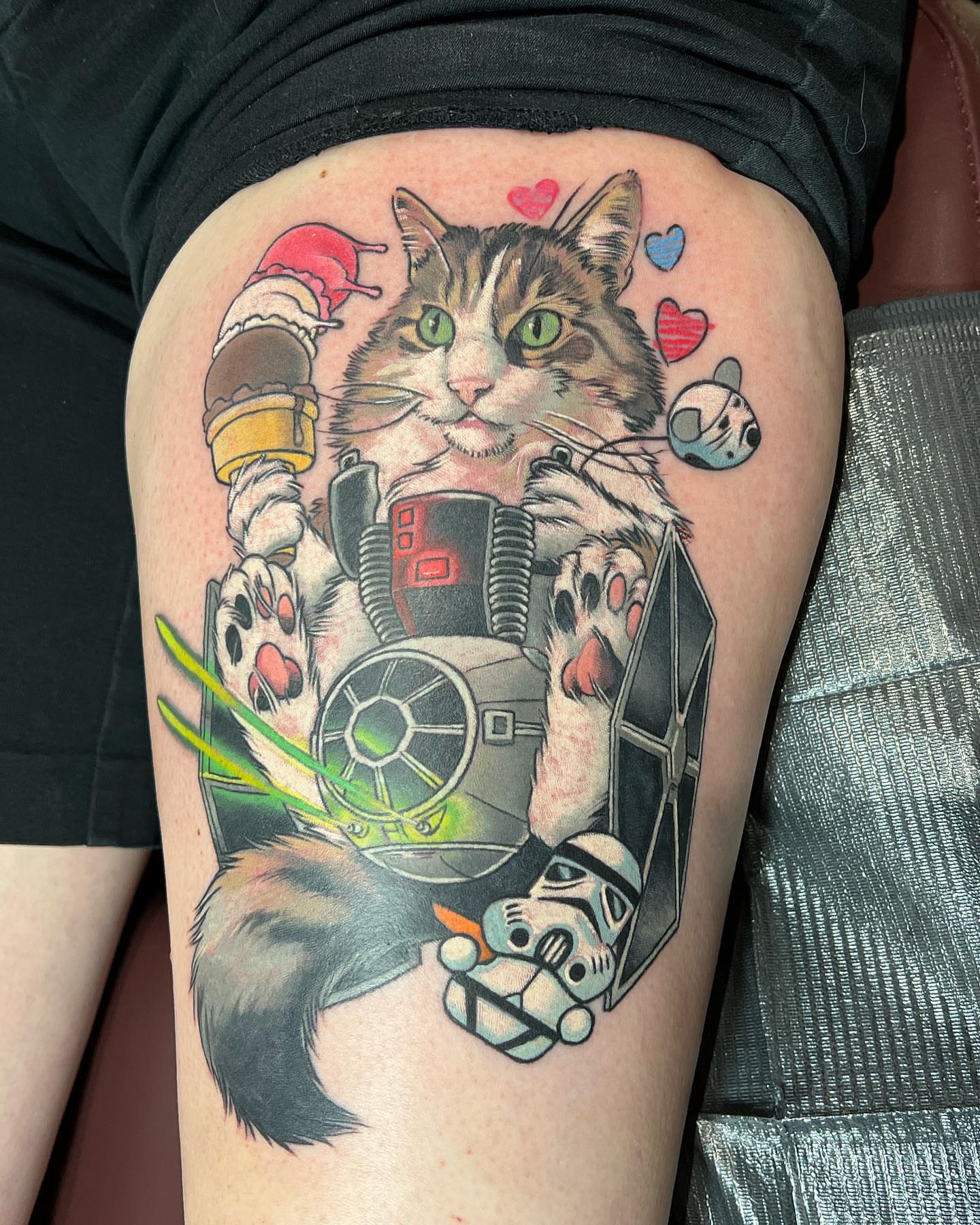 Cat in space suit realism tattoo on the thigh by Walter Frank