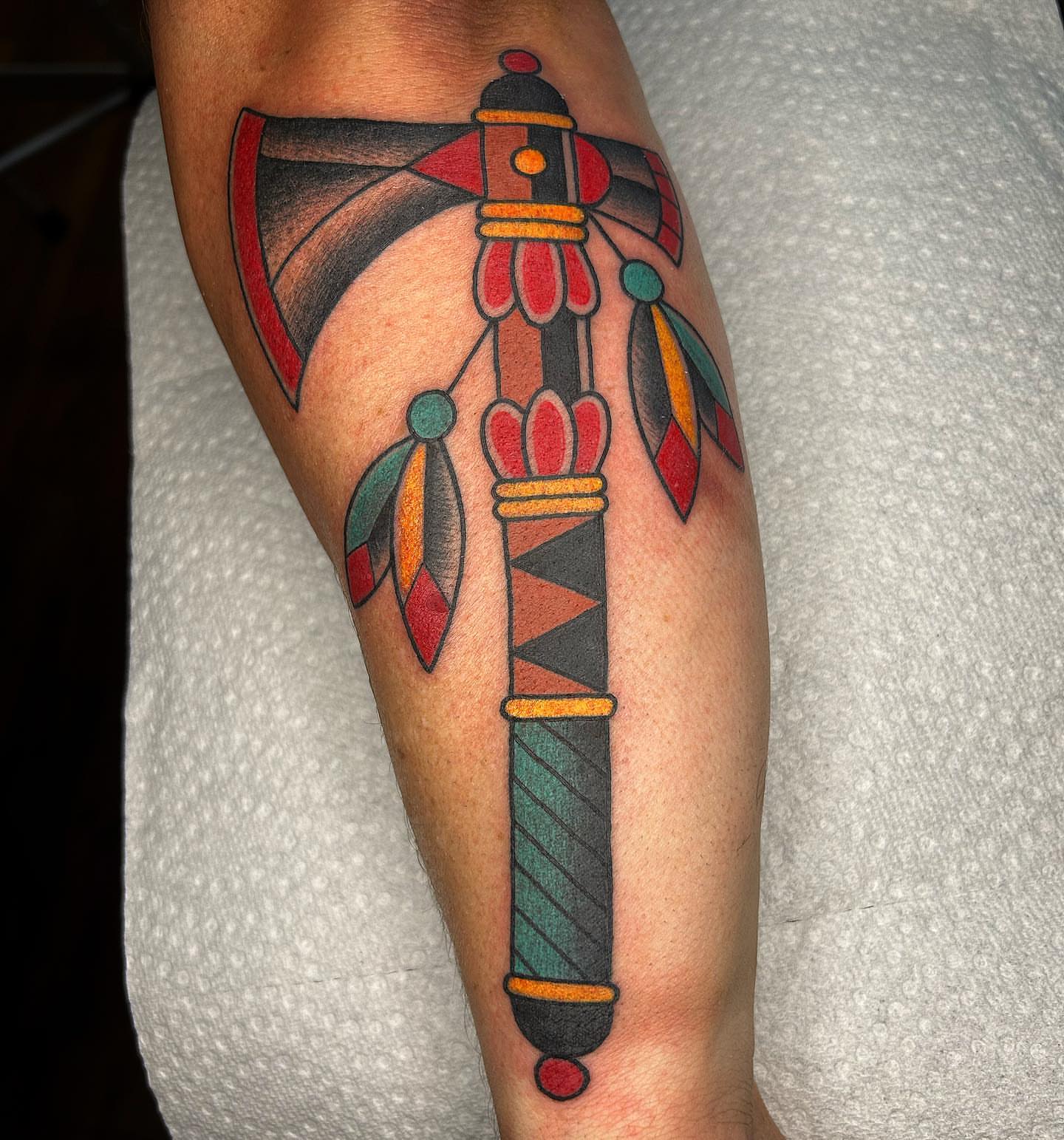 Ax American traditional tattoo on the forearm by Pat Moser