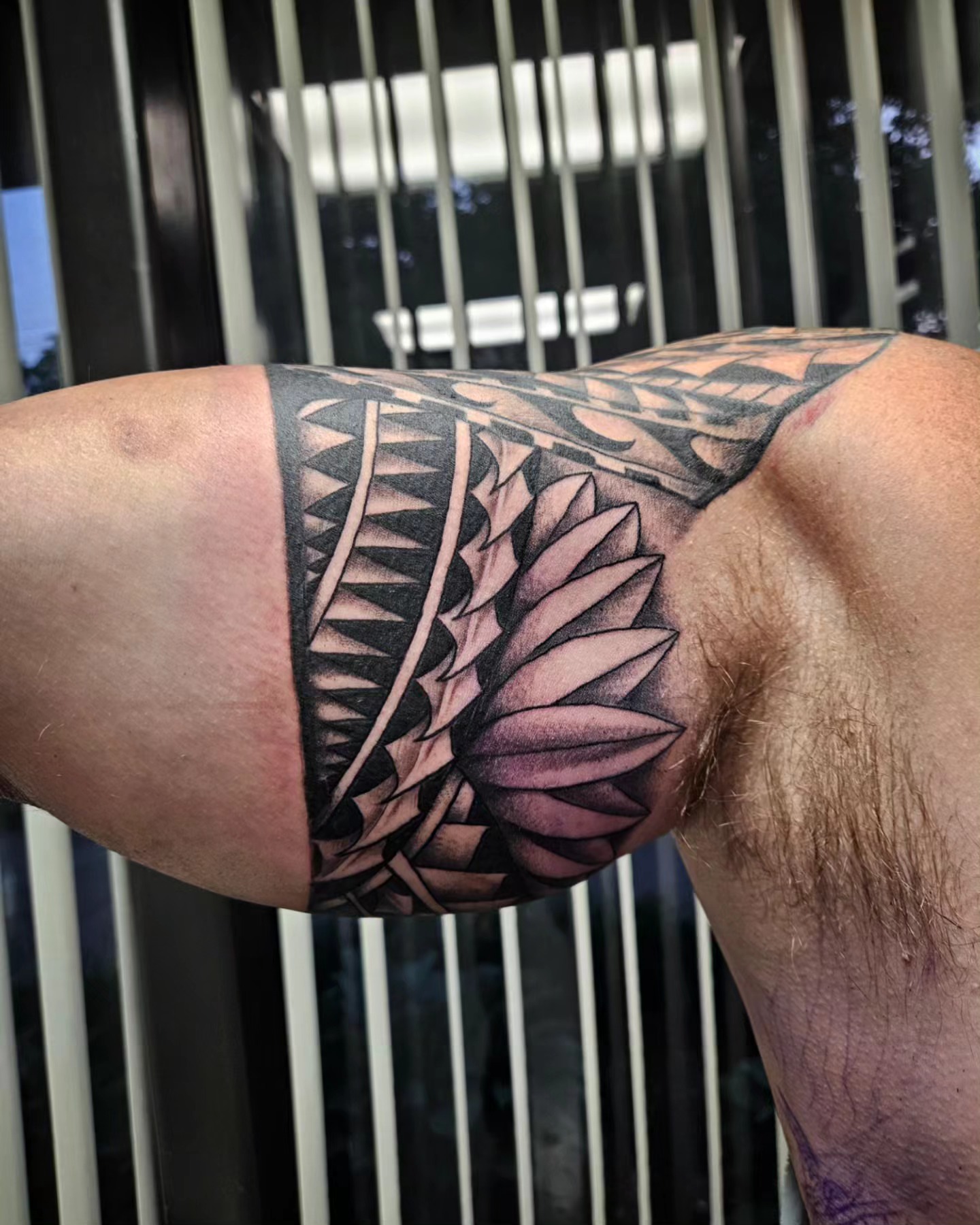 Floral pattern tribal tattoo on the thigh by Chicagoland Tattoo artist - Dany Rojas