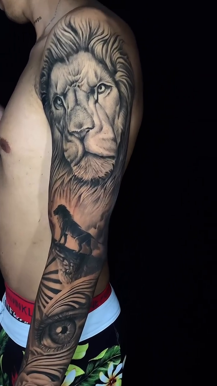 Lion and eagle sleeve realism tattoo by Clayderman