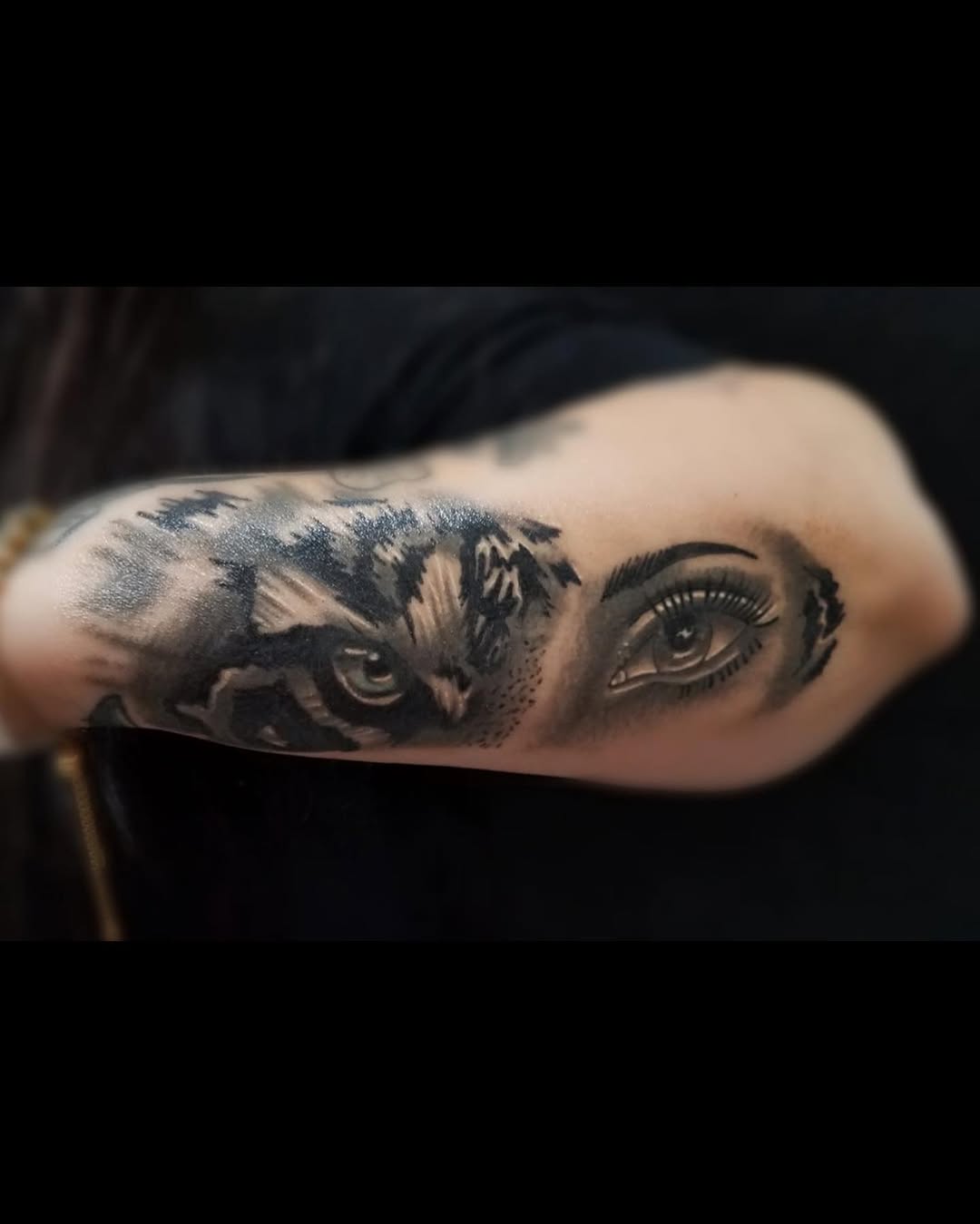 Owl and human eye realism tattoo on the forearm by Tattoos By Mauze