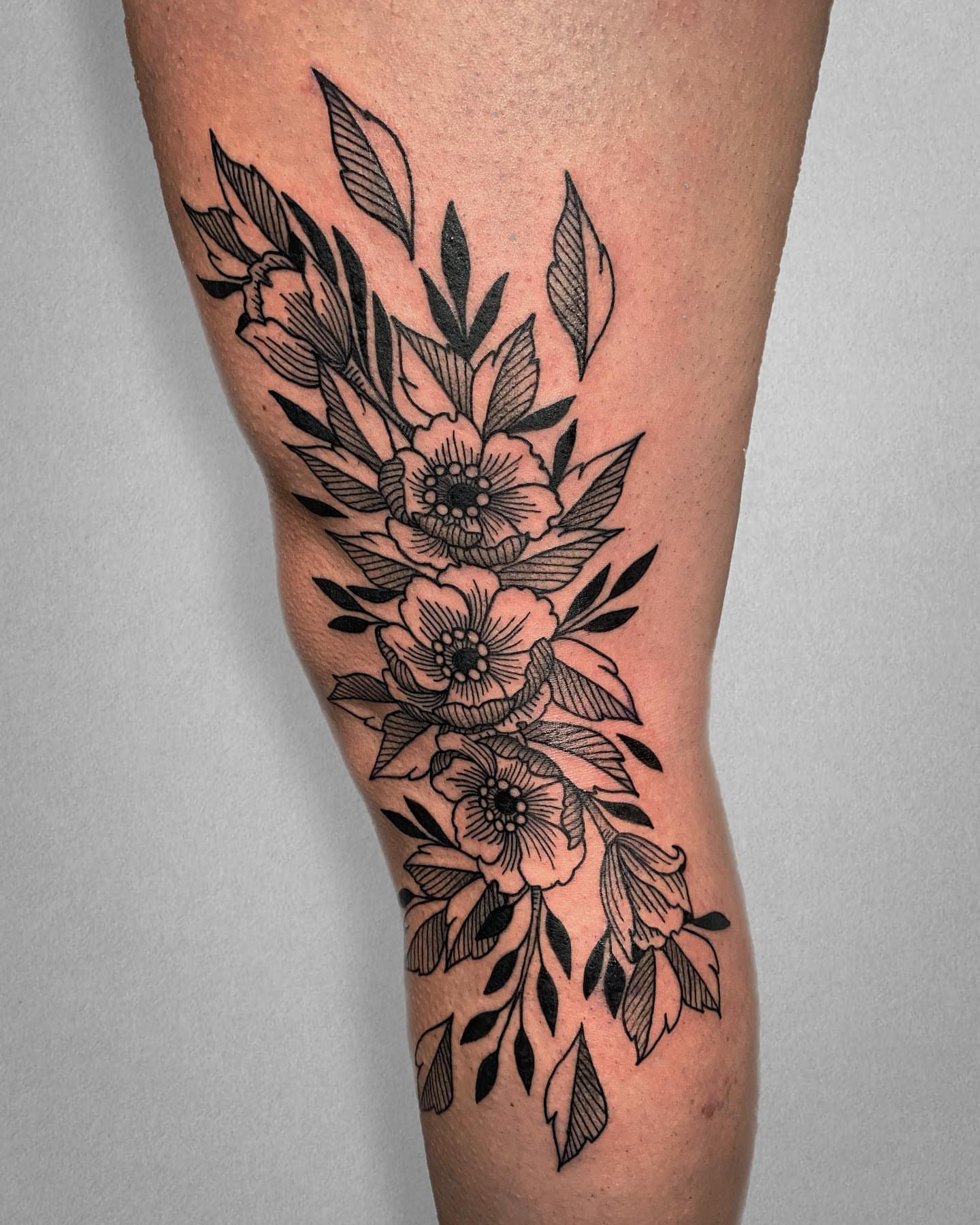 Floral arrangement black and grey tattoo on the leg by Mallory Miller π³οΈβπ Eugene
