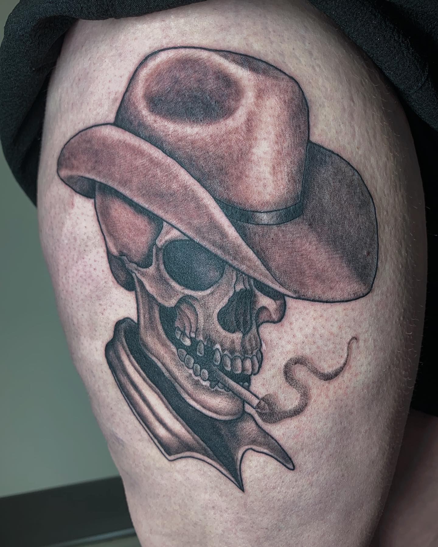 Cowboy skull realism tattoo on the thigh by Kolby