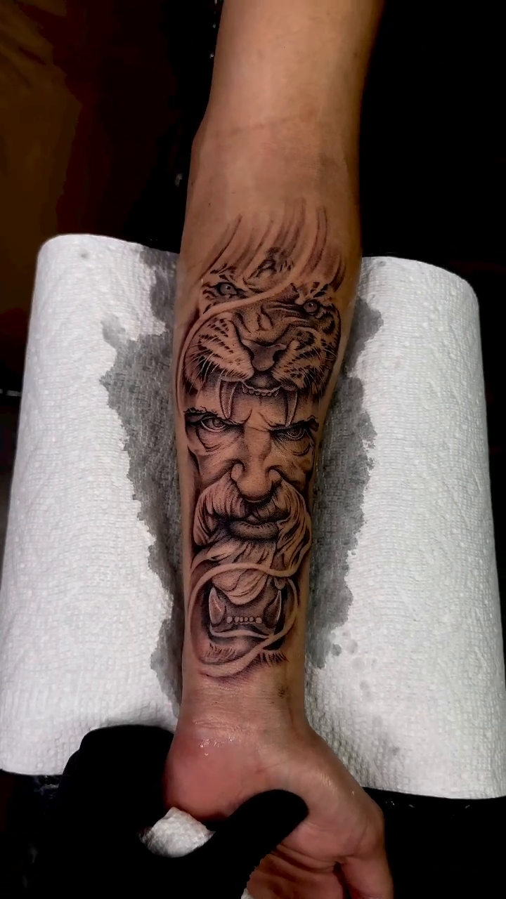 Multiple demonic faces dark realism tattoo by Cesar Nava