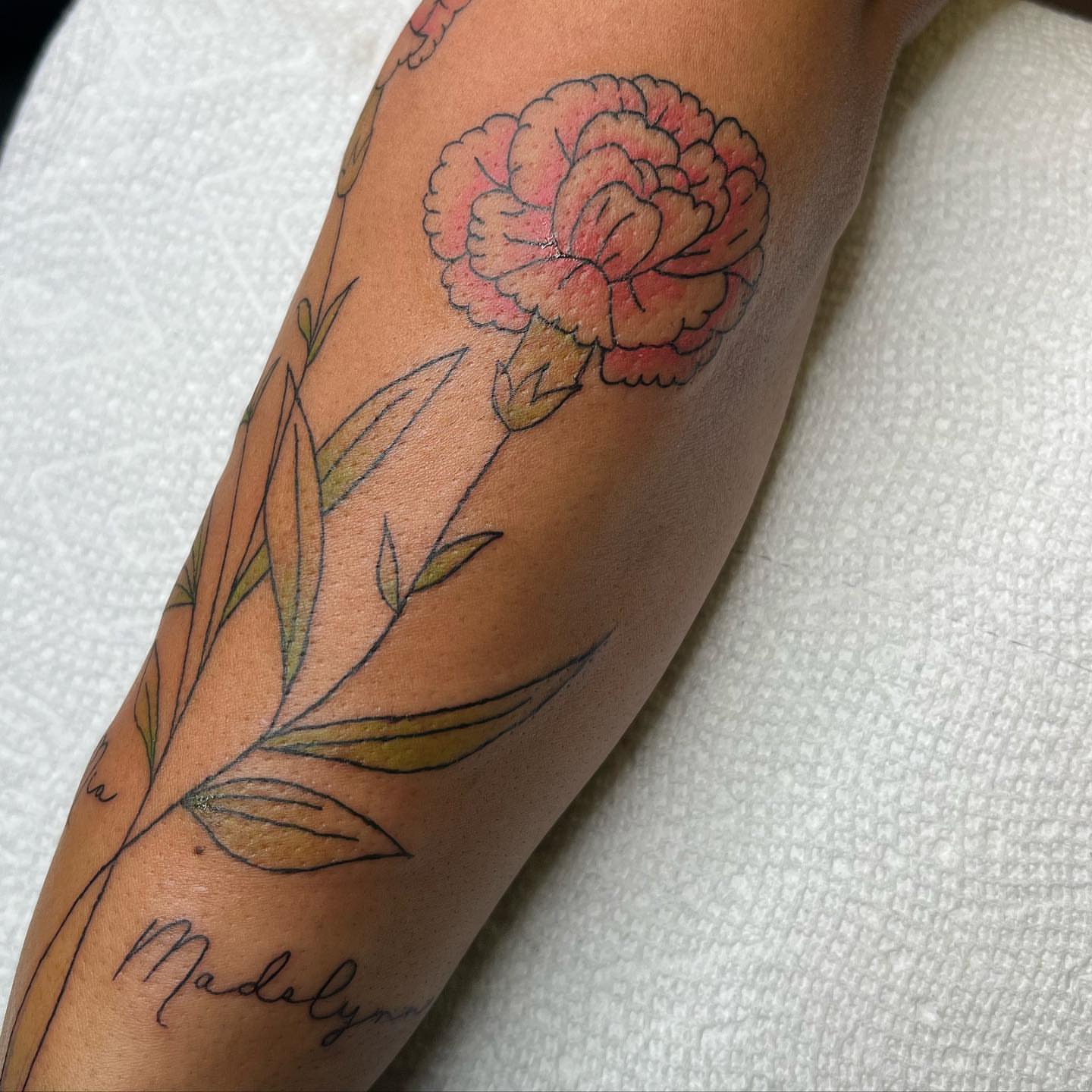 Peony flower realism tattoo on the forearm by Kayla Cordova