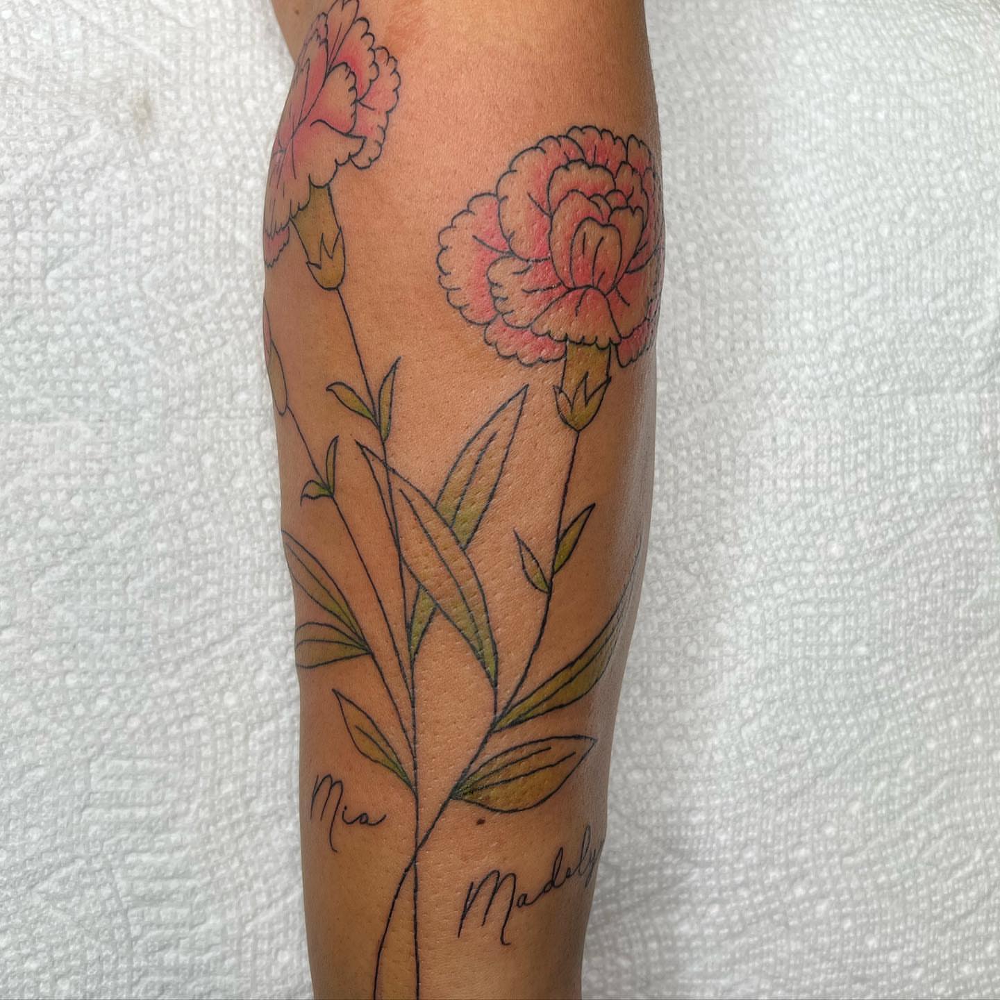 Carnation new school tattoo on the forearm by Kayla Cordova