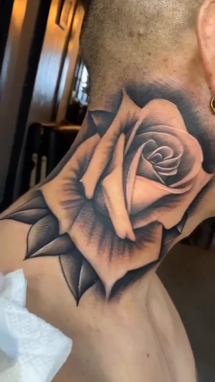 Rose realism tattoo by Joseph Alvarado