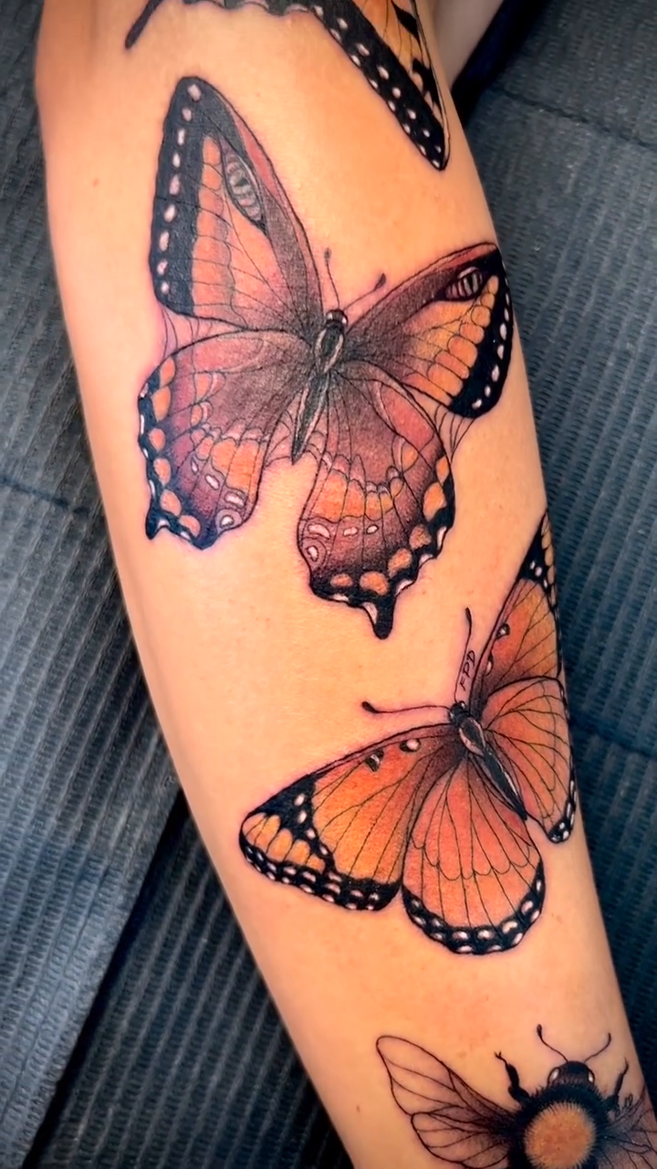 Butterflies and a bee realism tattoo by Mia Manzanedo