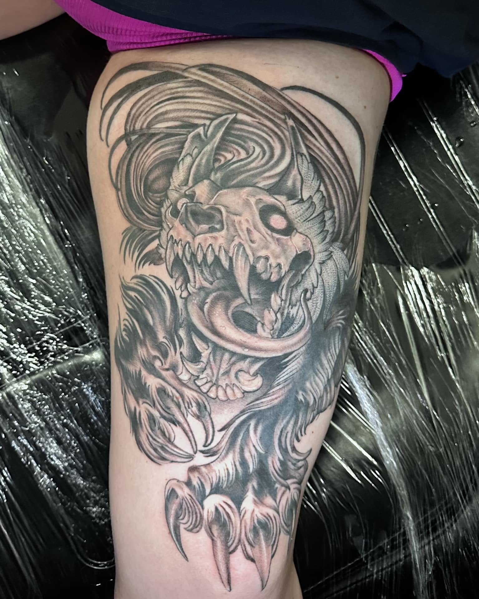 Skull with flames realism tattoo on the thigh by Valen Laska