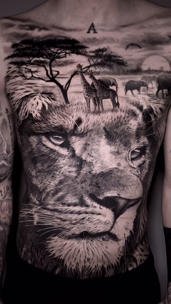 Lion and African savanna scene realism tattoo by Jesus Alonso