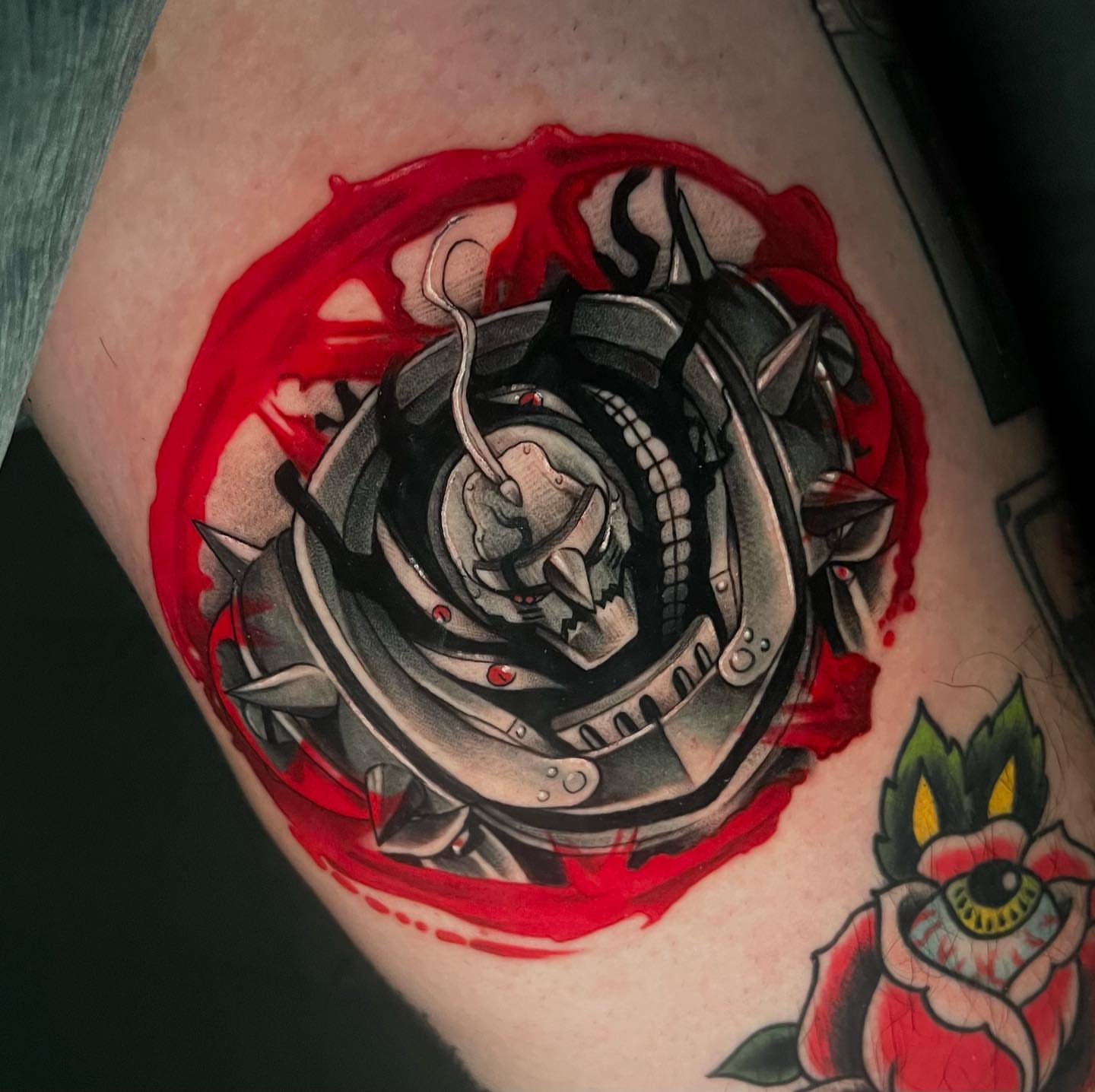 Mecha dark realism tattoo on the thigh by emi