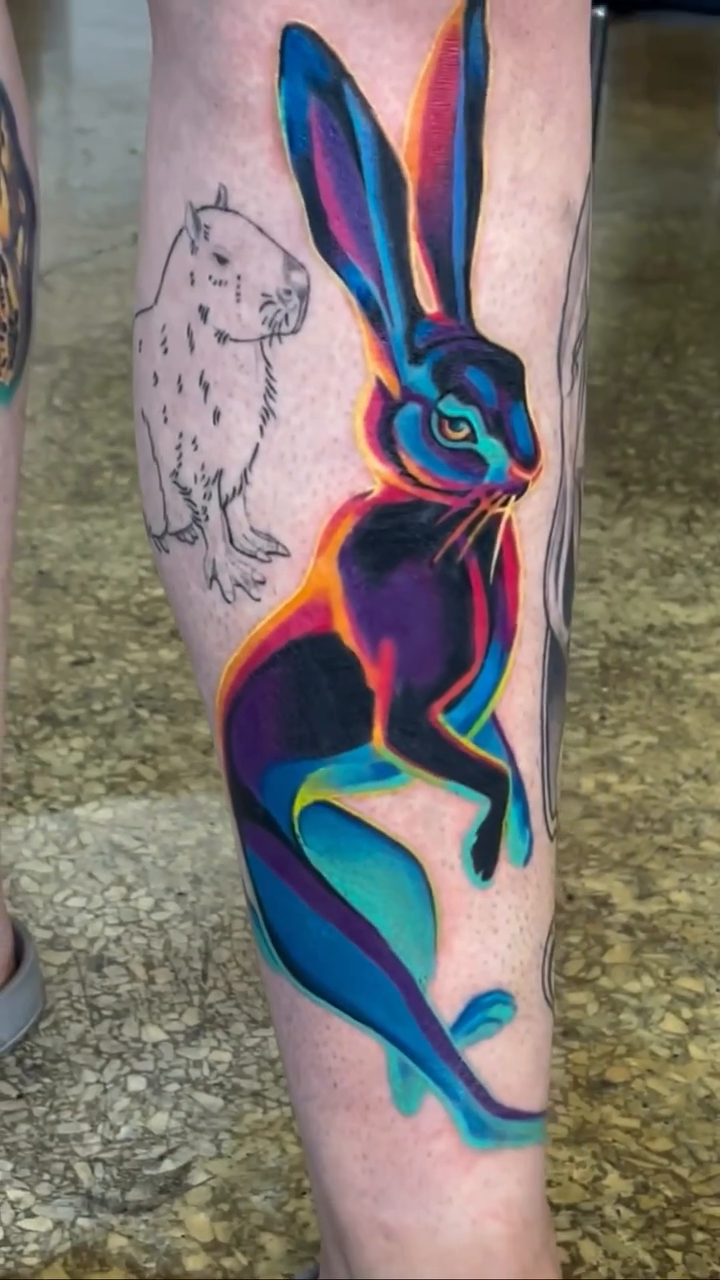 Stylized rabbit geometric tattoo by Sienna Coppa
