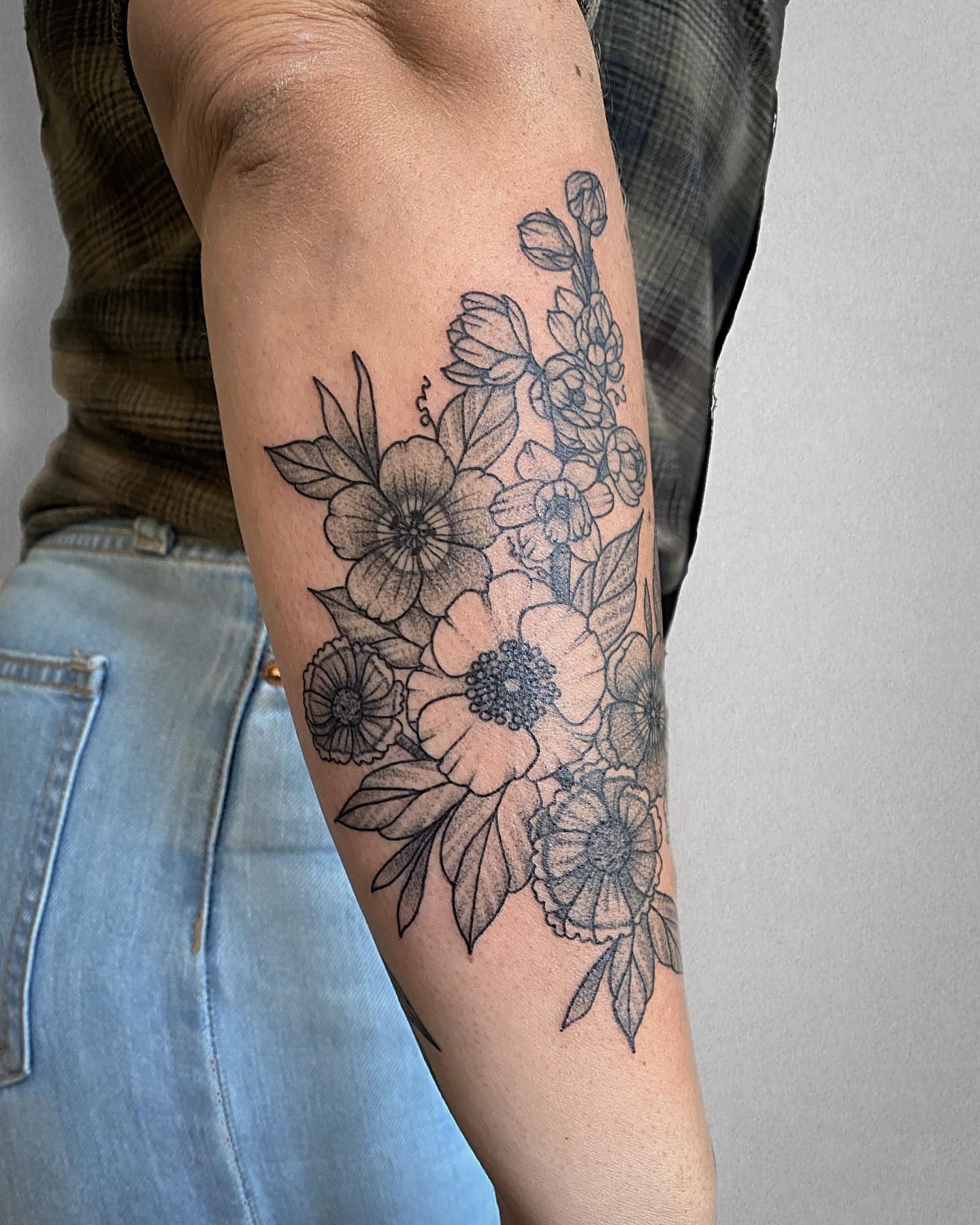 Flower bouquet black and grey tattoo on the forearm by Mallory Miller π³οΈβπ Eugene