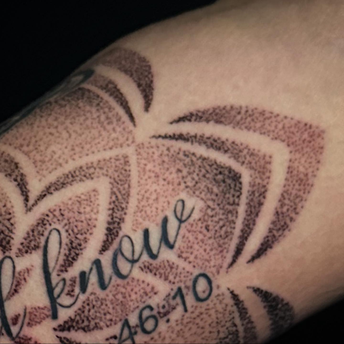 Script lettering dotwork tattoo on the forearm by "CAM", West Palm Beach, Florida