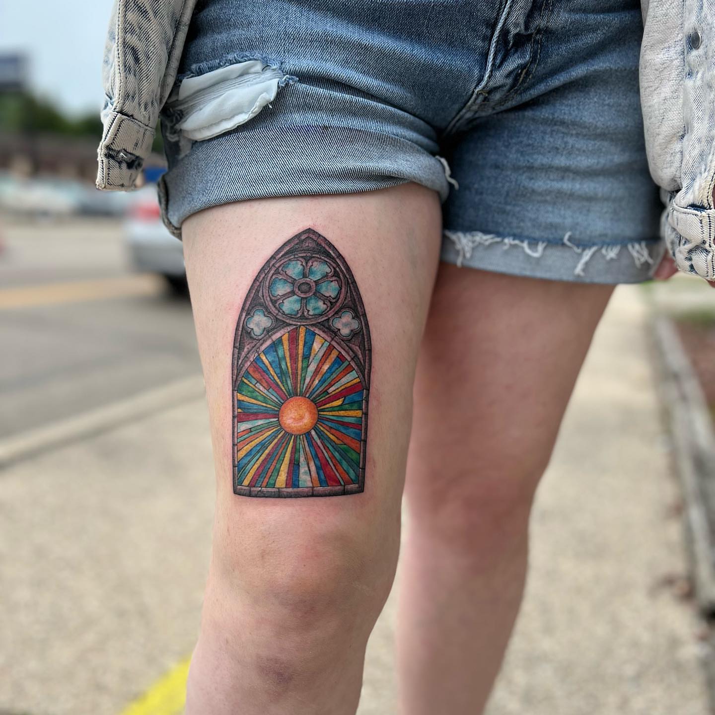 Stained glass window geometric tattoo on the thigh by William Worley