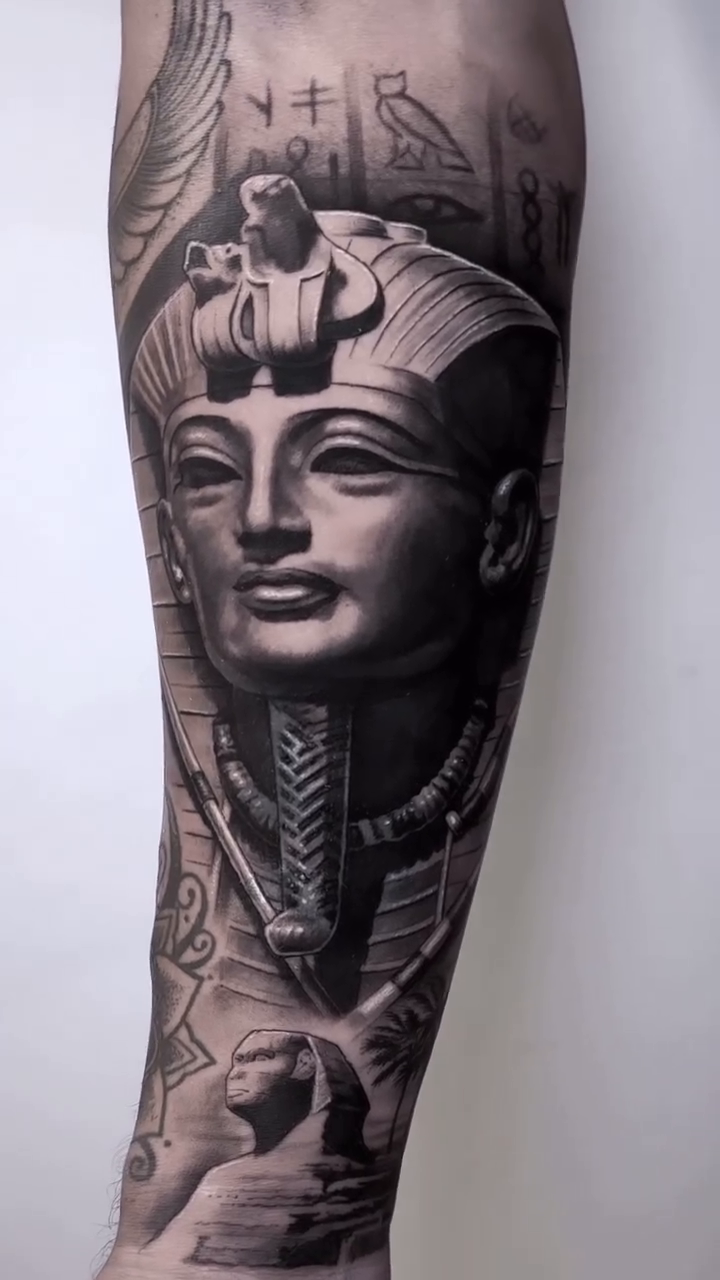 Pharaoh's head with Egyptian motifs realism tattoo by Jesus Alonso