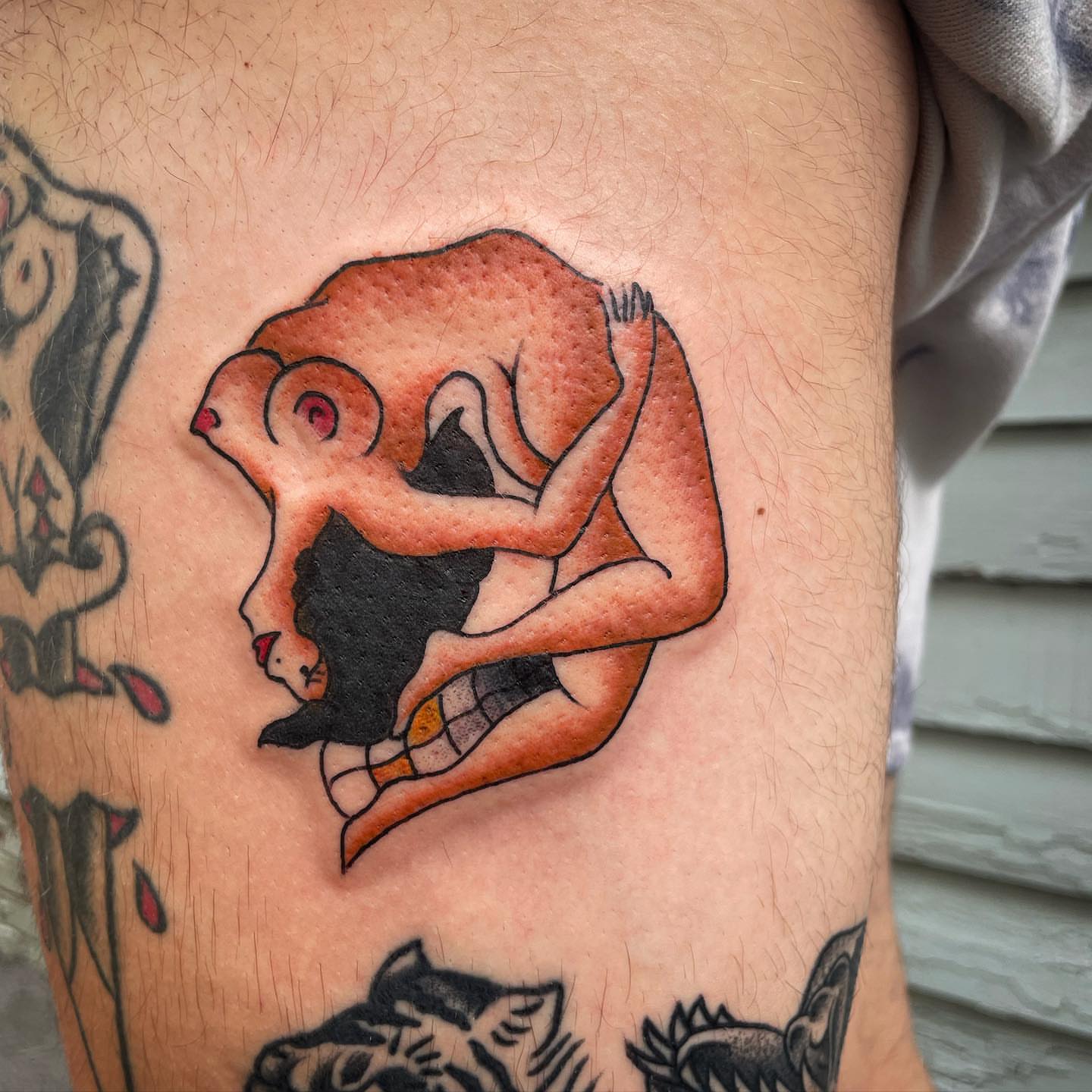 Monkey American traditional tattoo on the thigh by Kimberly Shordon