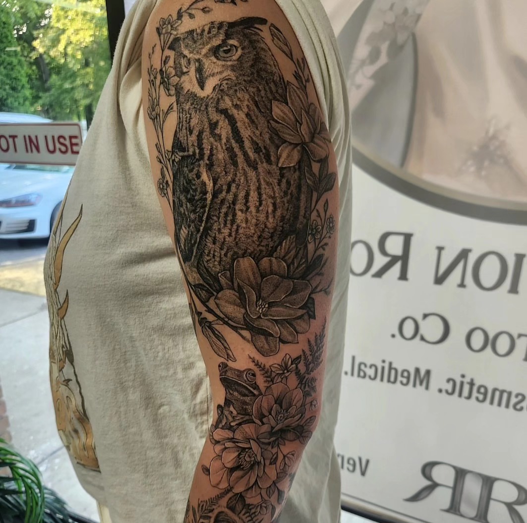 Owl and floral realism tattoo on the forearm by Kyle Joseph [tattoo artist]