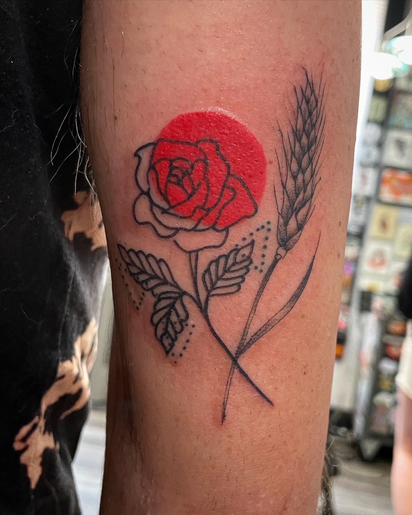 Rose and wheat dotwork tattoo on the forearm by Kimberly Shordon
