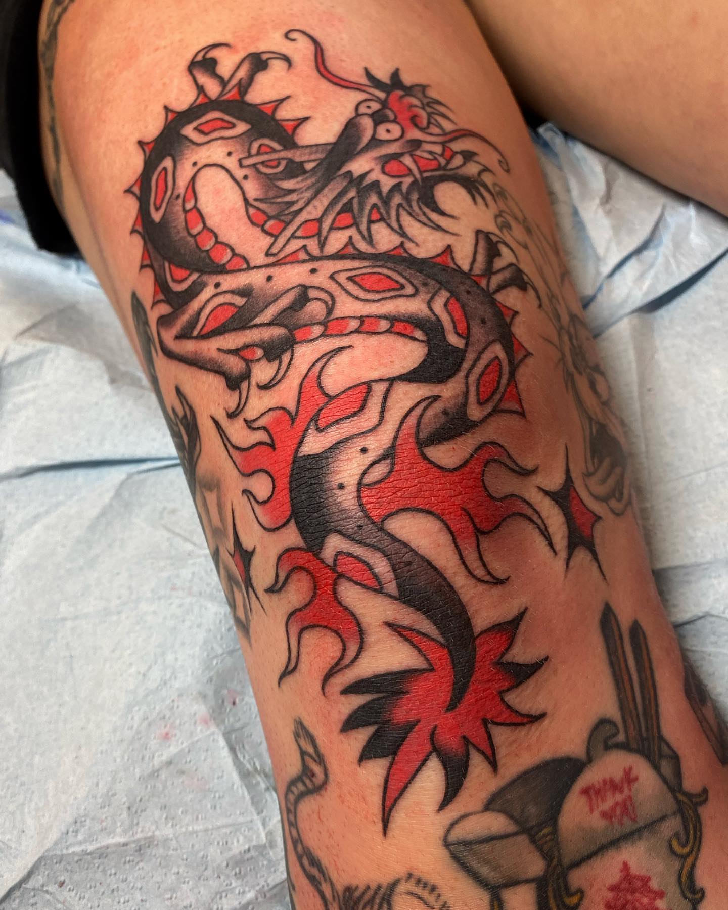 Dragon American traditional tattoo on the thigh by Alan Pham, San Jose, California