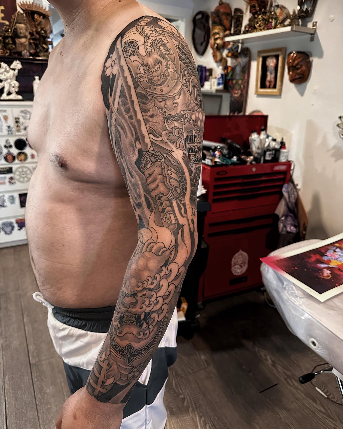 Samurai warrior japanese irezumi tattoo on the upper arm by Xiaojun Yin, Vancouver, British Columbia