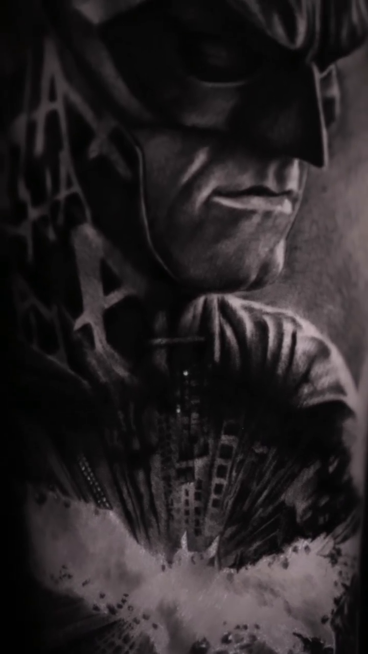 Batman portrait realism tattoo by Luis Bravo