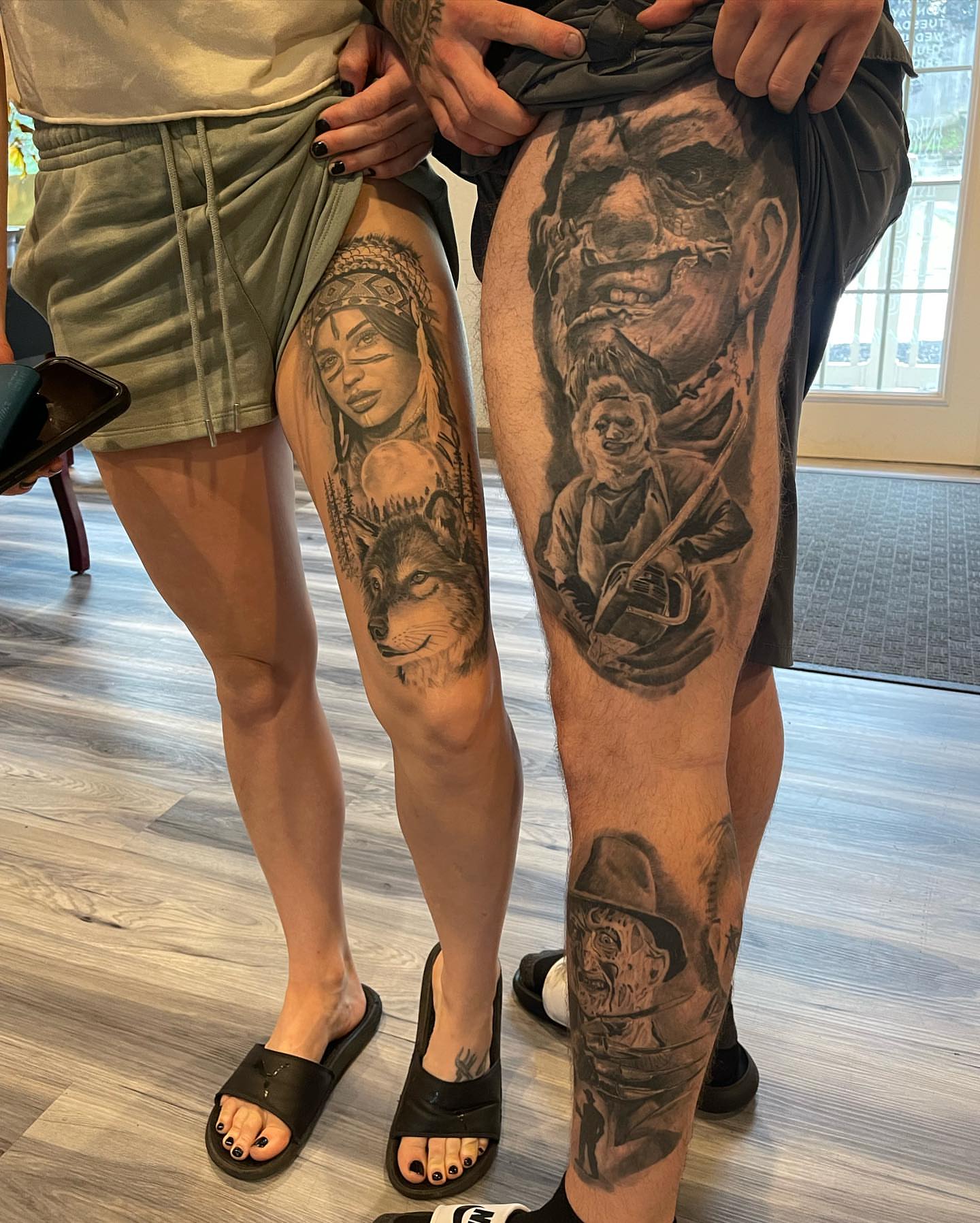 Wolf and woman realism tattoo on the thigh by Antonio Massimino