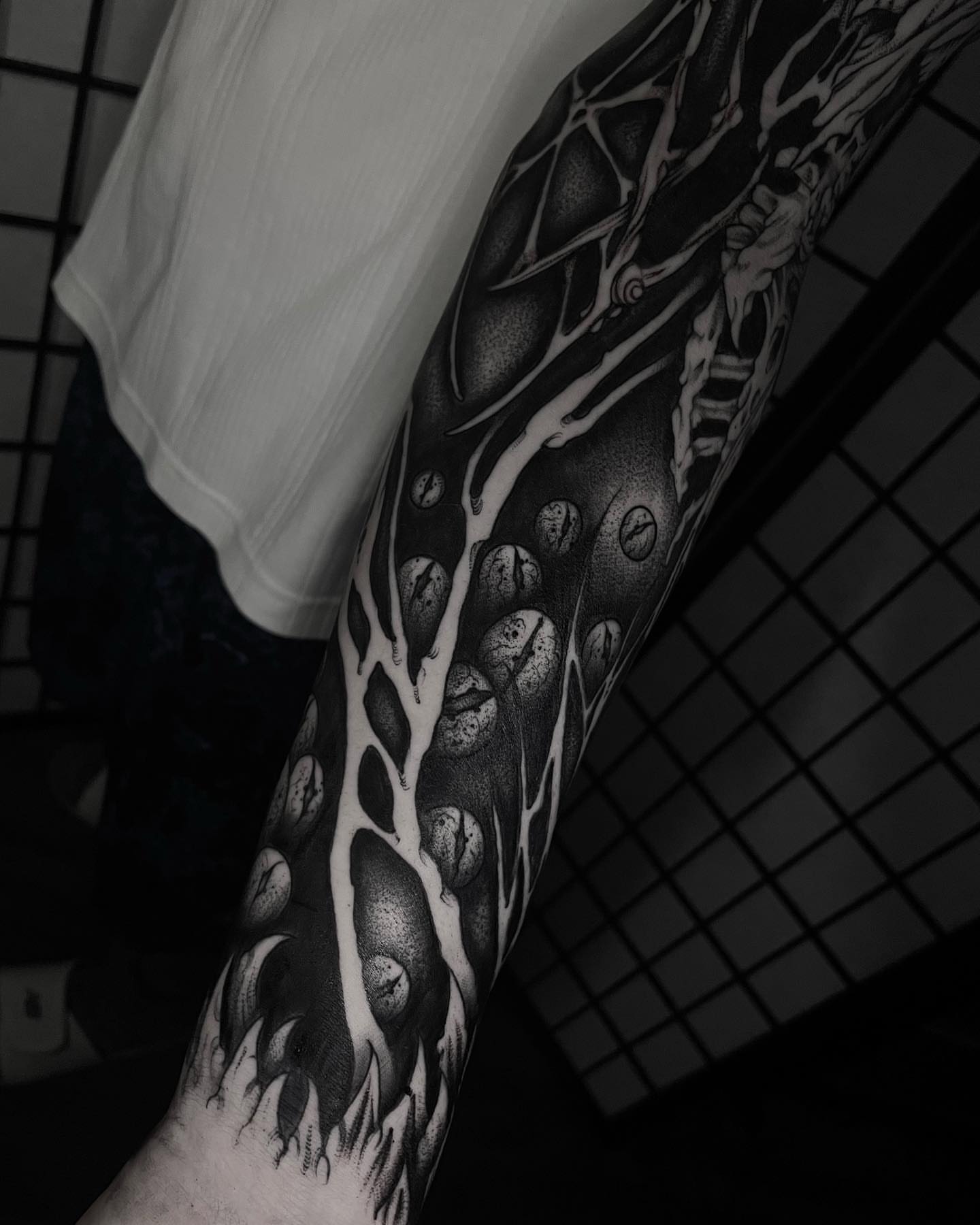 Veins and spheres geometric tattoo on the forearm by Sofia Rose
