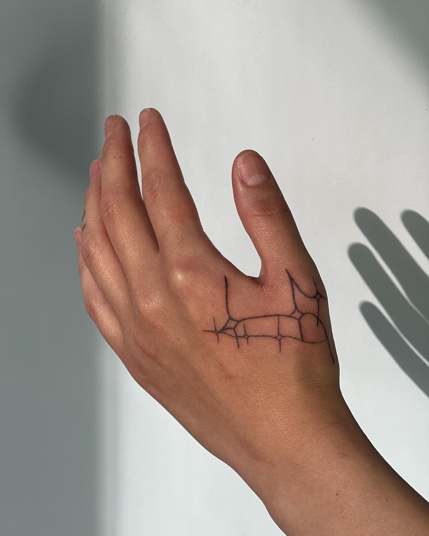 Tattoo by @deuxmainstattoo — geometric
