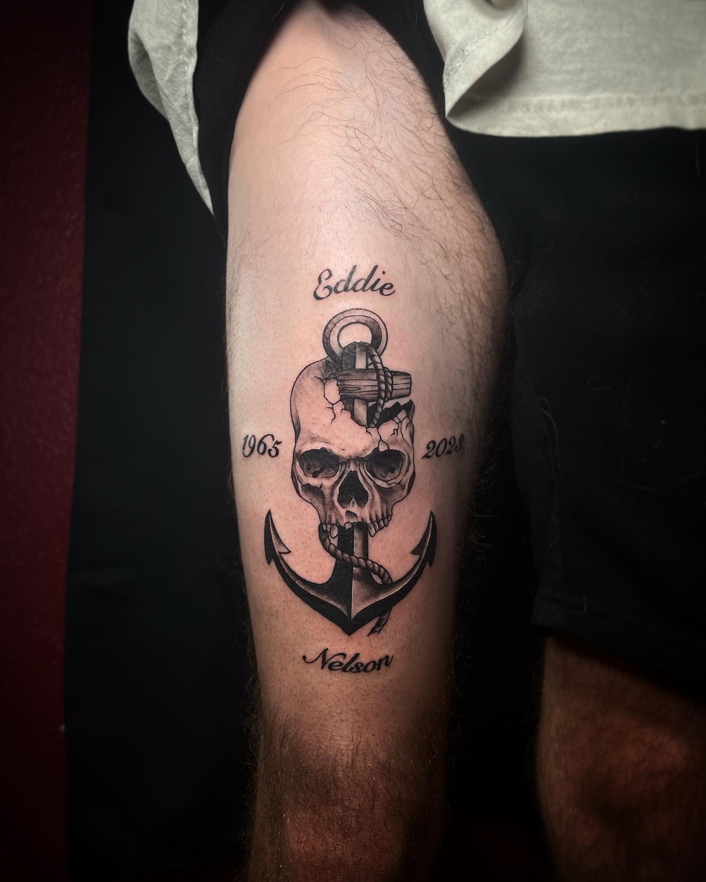 Anchor with skull black and grey tattoo on the forearm by Tattoos by Tessa