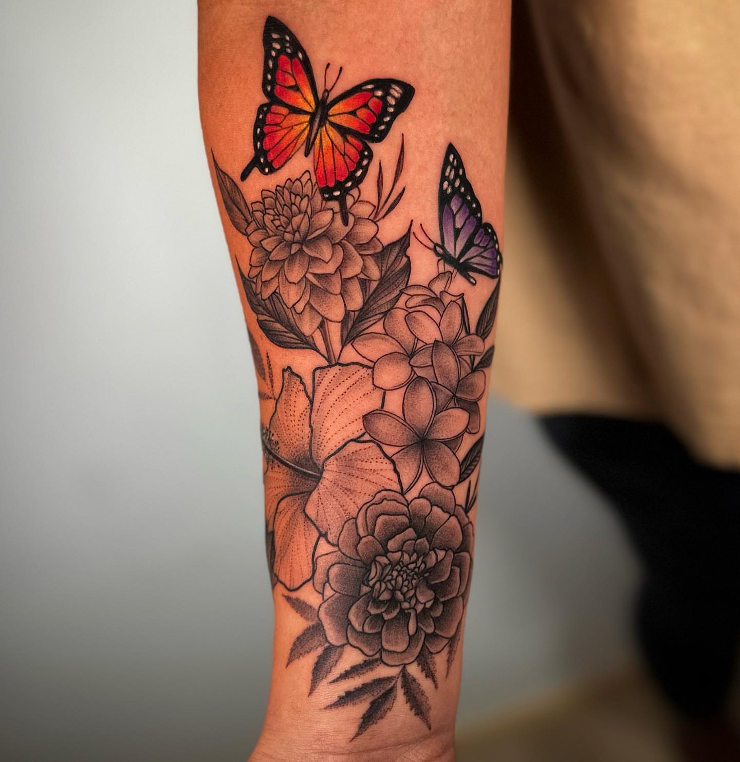 Flowers and butterflies dotwork tattoo on the forearm by all gas no brakes! no days off!