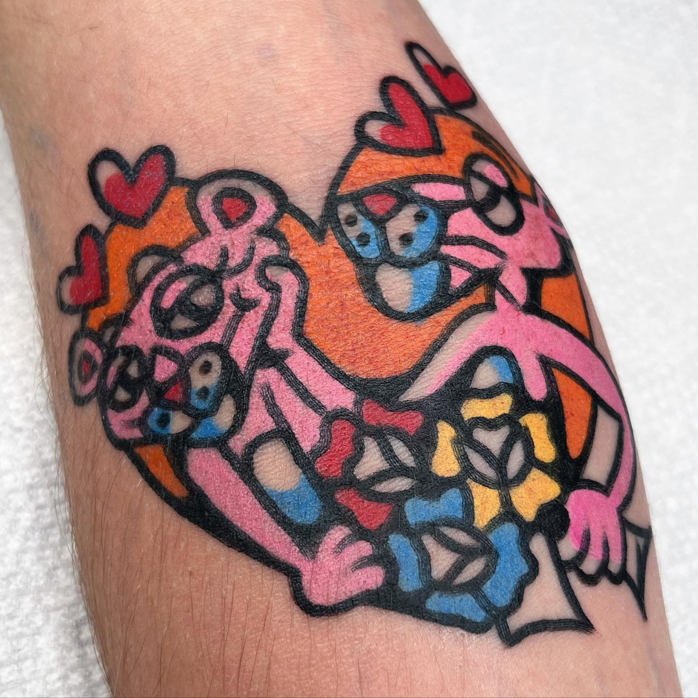 Pink panther and cat new school tattoo on the forearm by Oldschool Tattooer Takii 타키