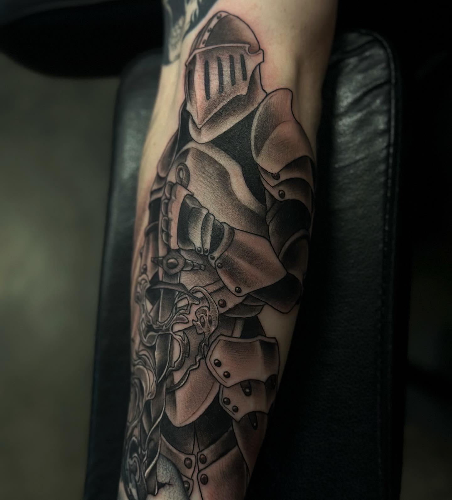 Knight armor realism tattoo on the forearm by audi