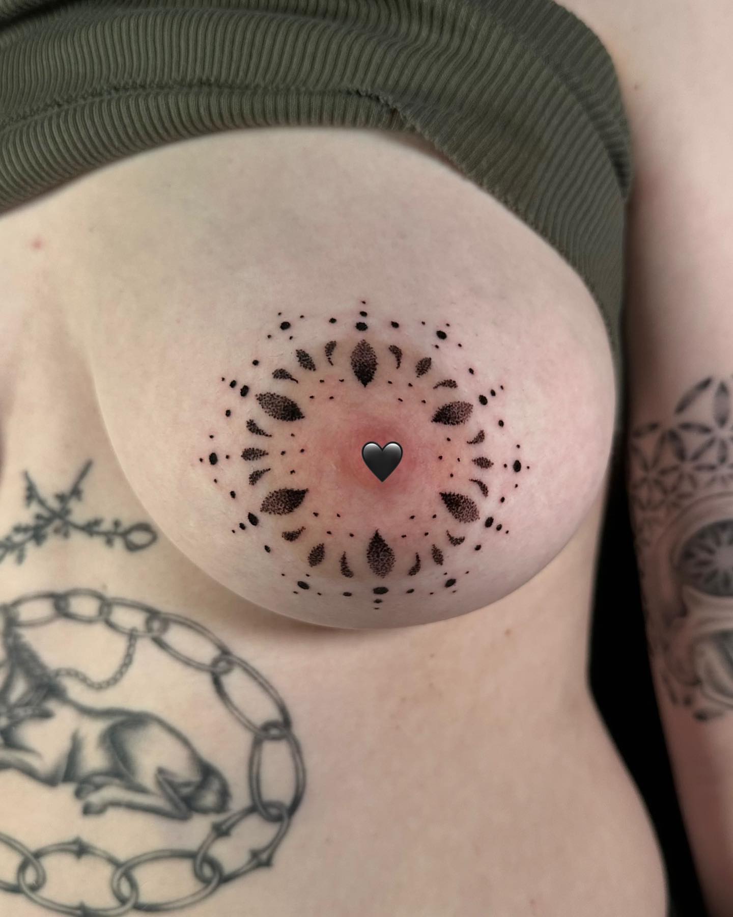 Dotwork mandala dotwork tattoo on the torso by Chelsey