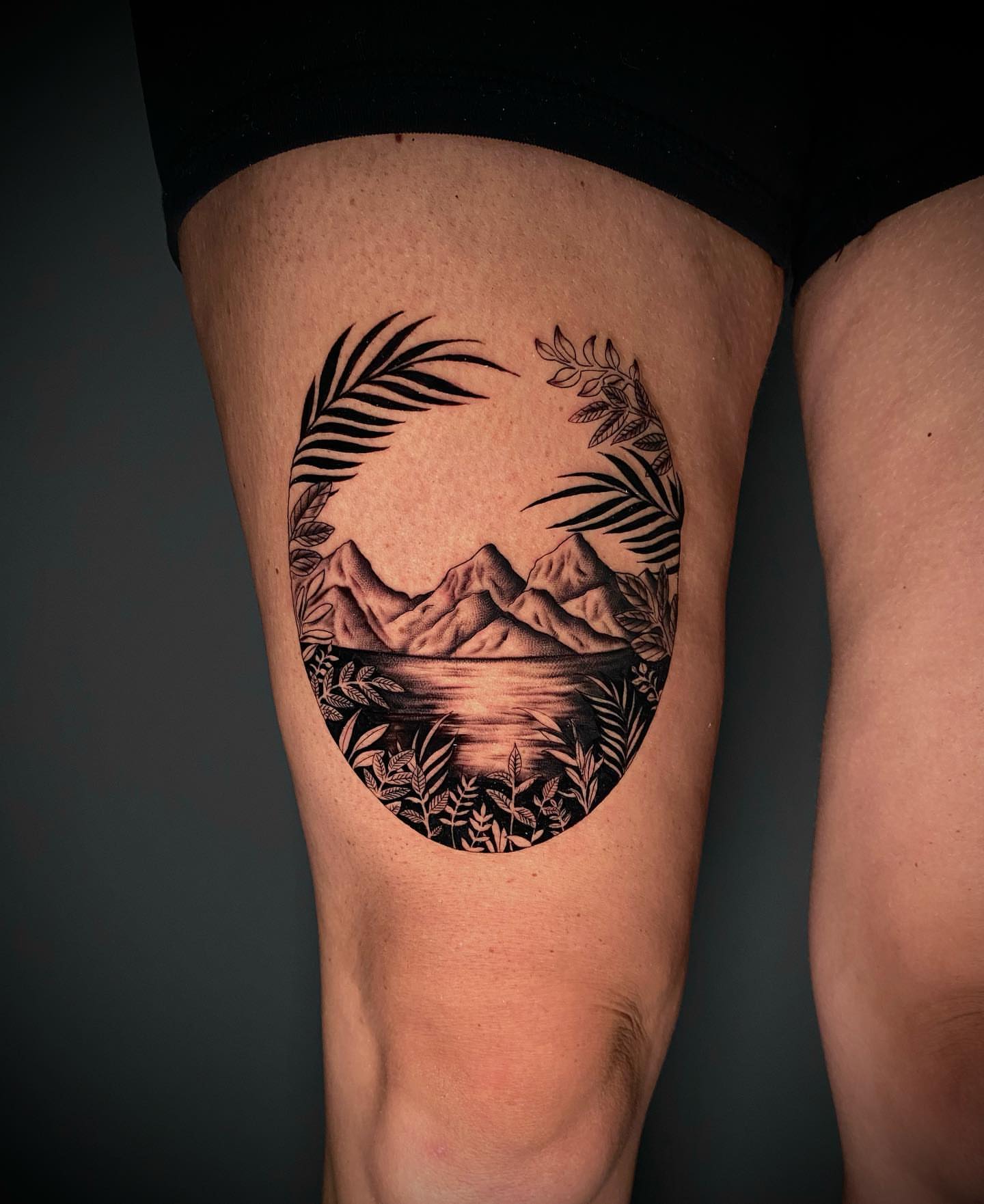 Mountain landscape realism tattoo on the thigh by Becky Lee Cameron