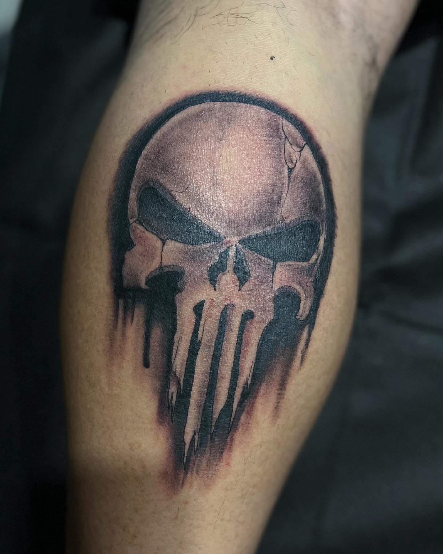 Punisher skull realism tattoo on the thigh by Morgan Jones