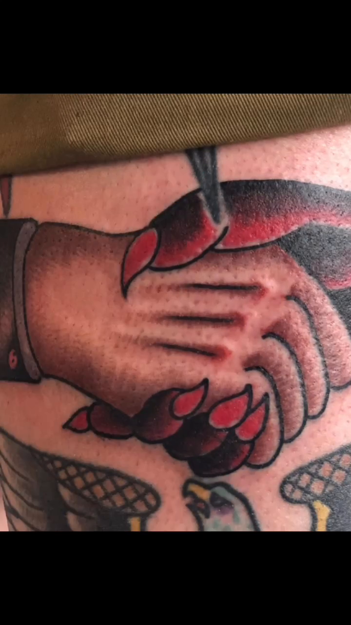 Shaking hands American traditional tattoo by Edward Choat