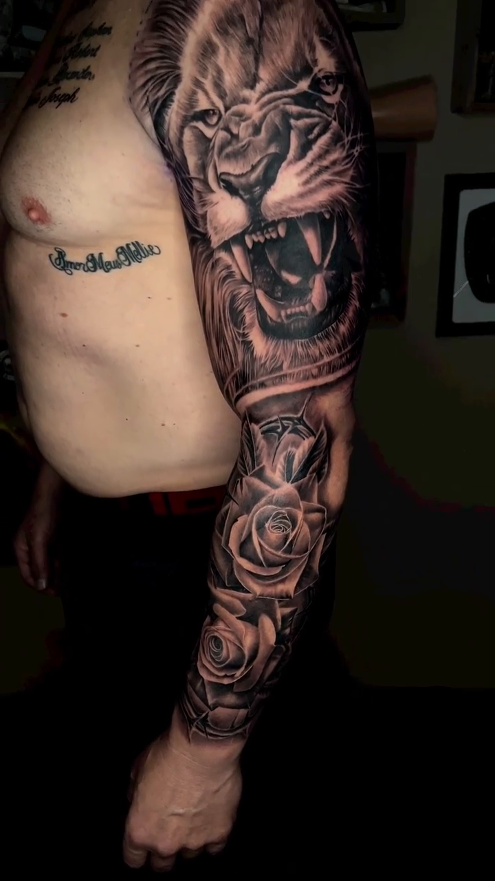 Tattoo by @mrgrouchtattoos — realism, black_and_grey