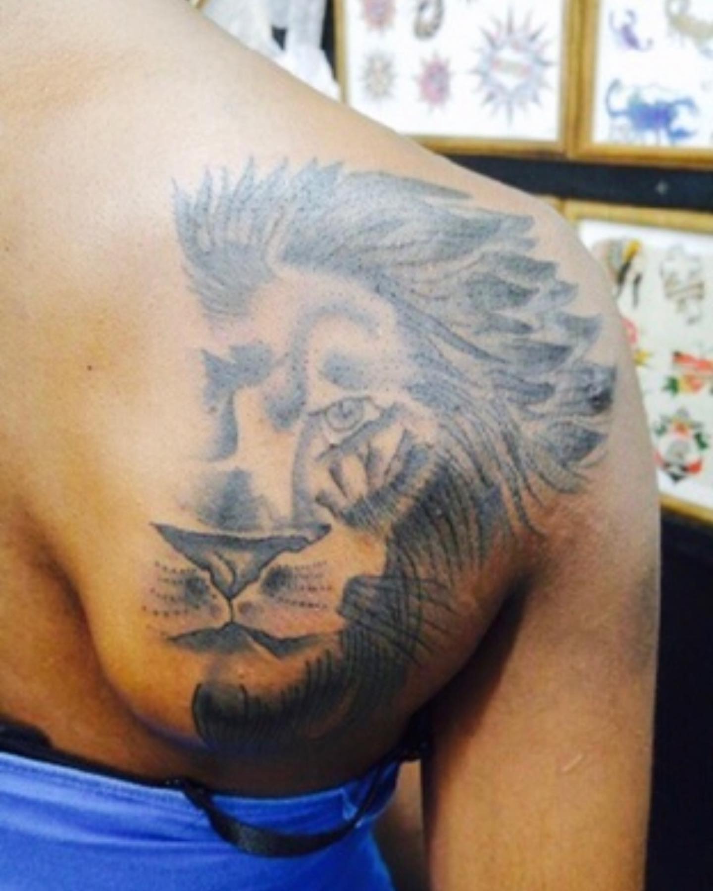 Lion realism tattoo on the chest by Anwon Johnson