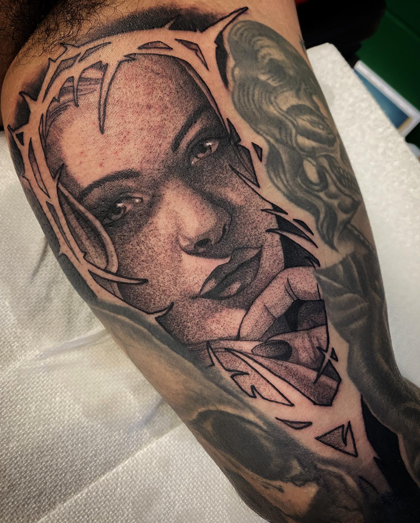 Woman with crown dotwork tattoo on the forearm by Angel Rodriguez