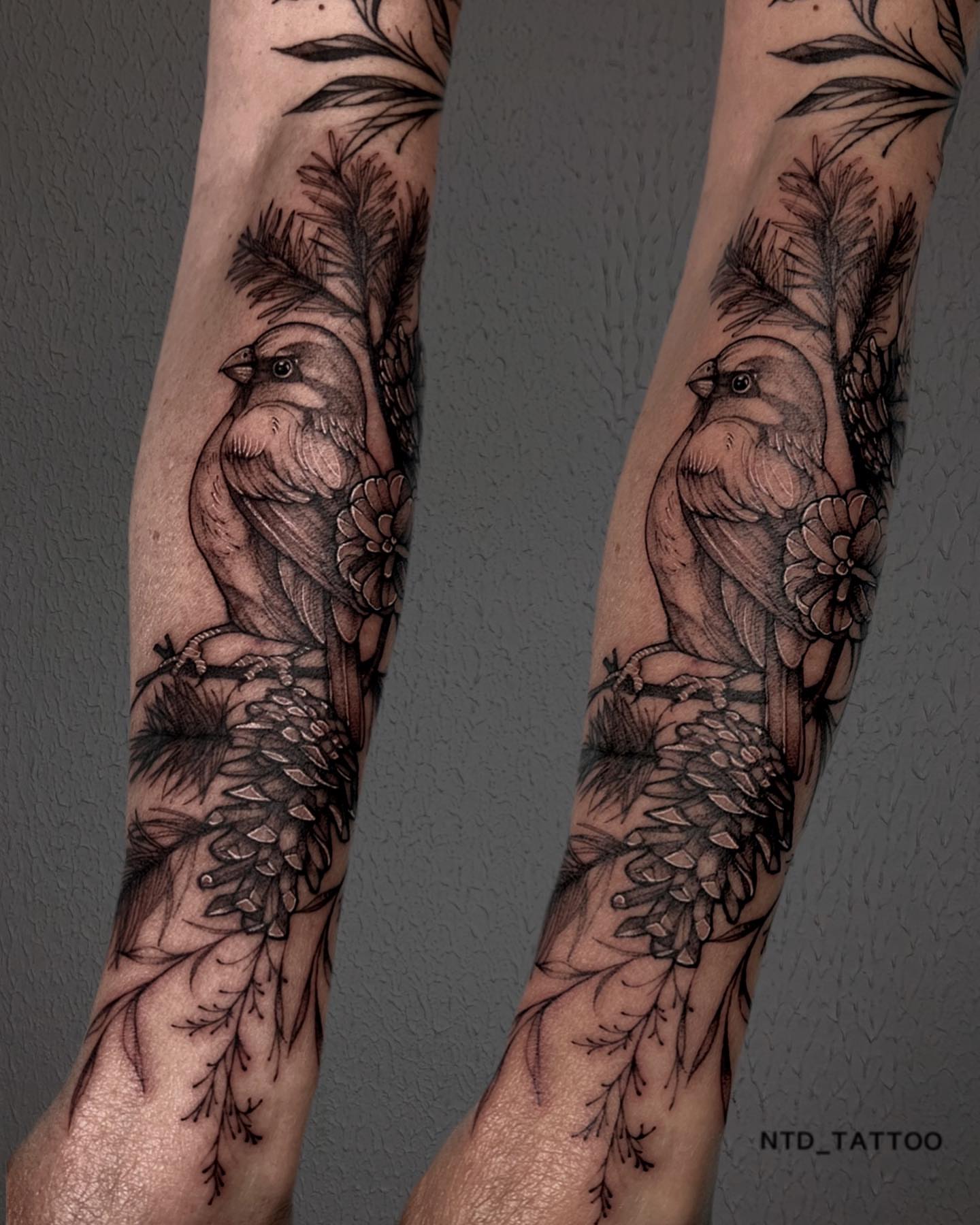 Bird and floral realism tattoo on the forearm by Tetiana Maxon