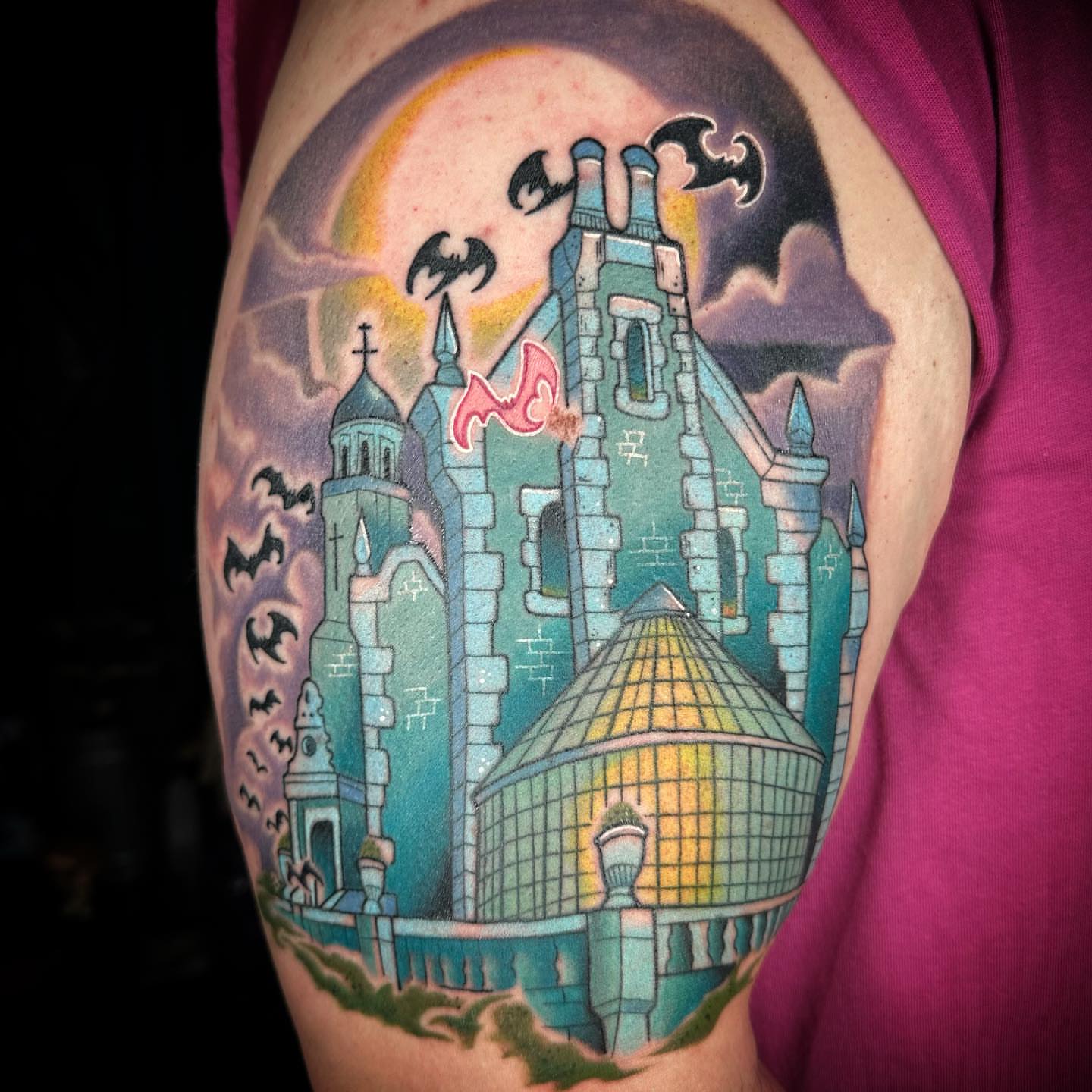 Castle American traditional tattoo on the upper arm by B.G. Germershausen